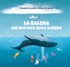 la balena che nuotava sulla schiena